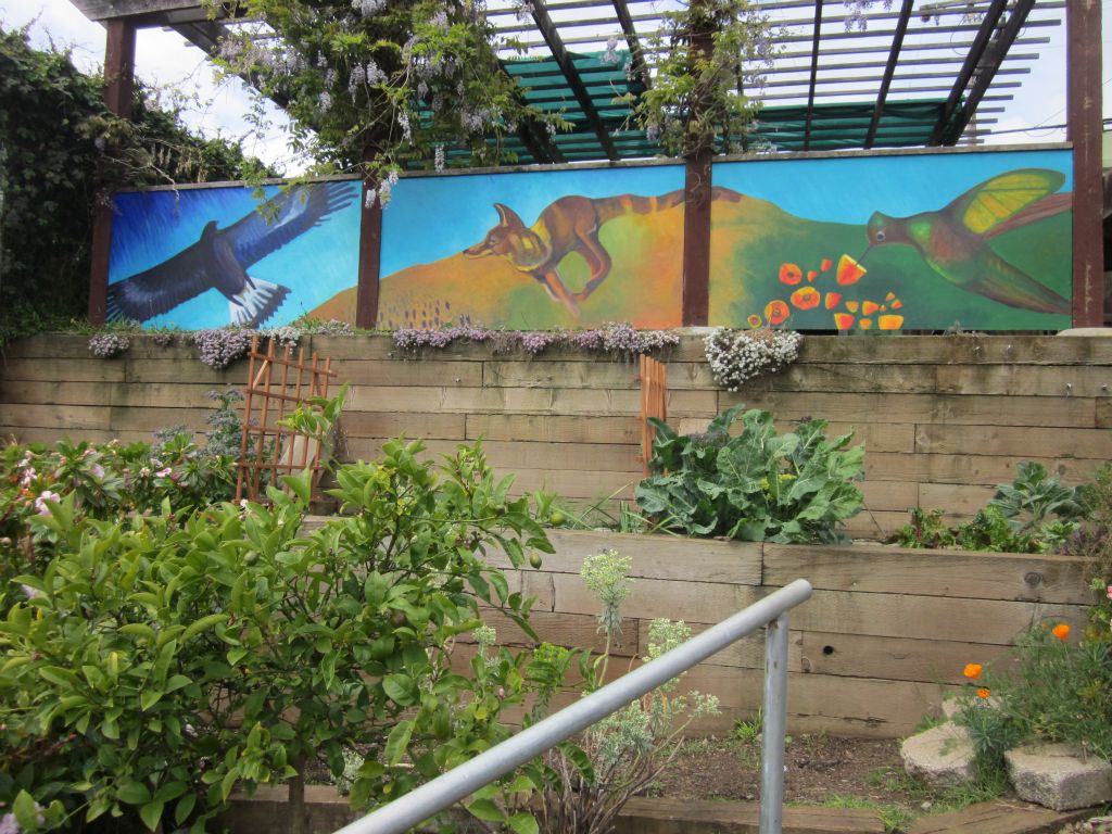 Ogden St Community Garden Mural, San Francisco, CA.  4’ X 21’  Designed and Painted by John Elliott  2011