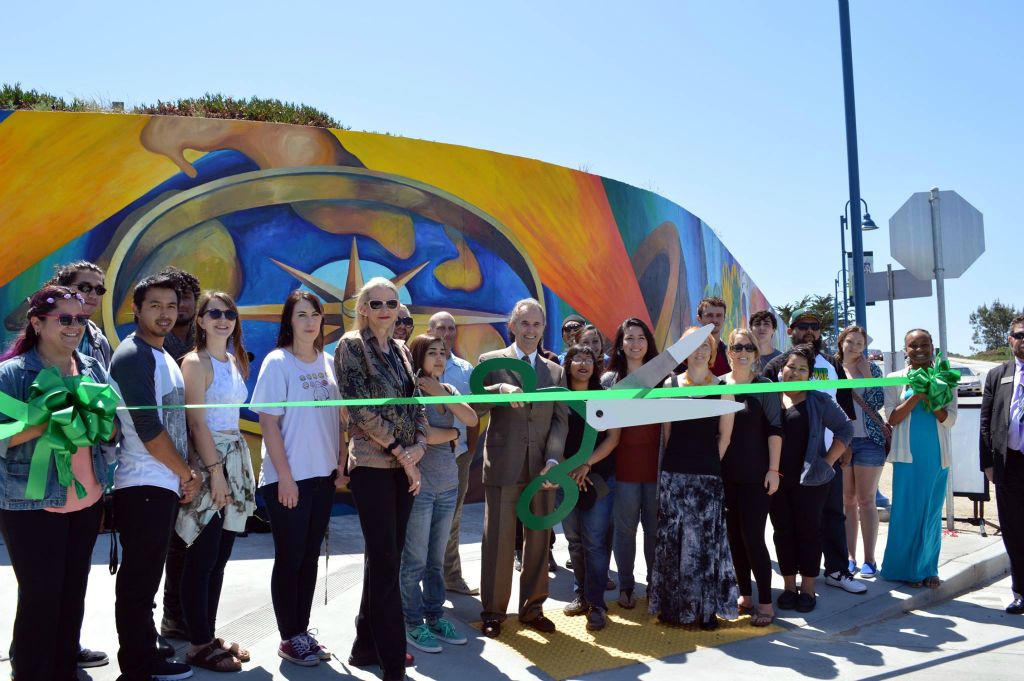 Ribbon cutting for Monterey Bay Vision Mural, designed and painted with CSUMB's mural class (Johanna Poethig Professor, John Elliott Mural Site Supervisor) ,  Marina, CA. 20’ x 300’  2015